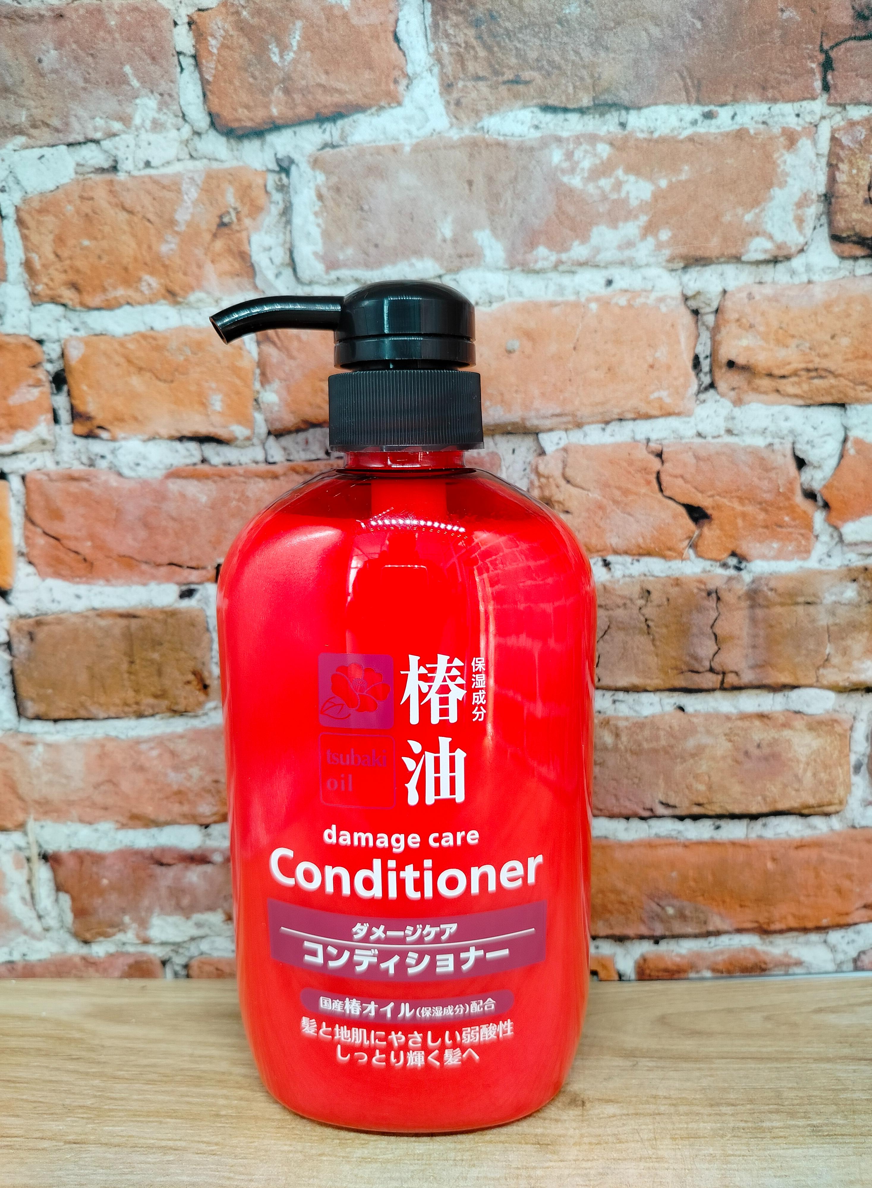 Kumano Cosmetics Tsubaki Oil Кондиционер для ухода за поврежденными волосами с маслом камелии 600 мл
