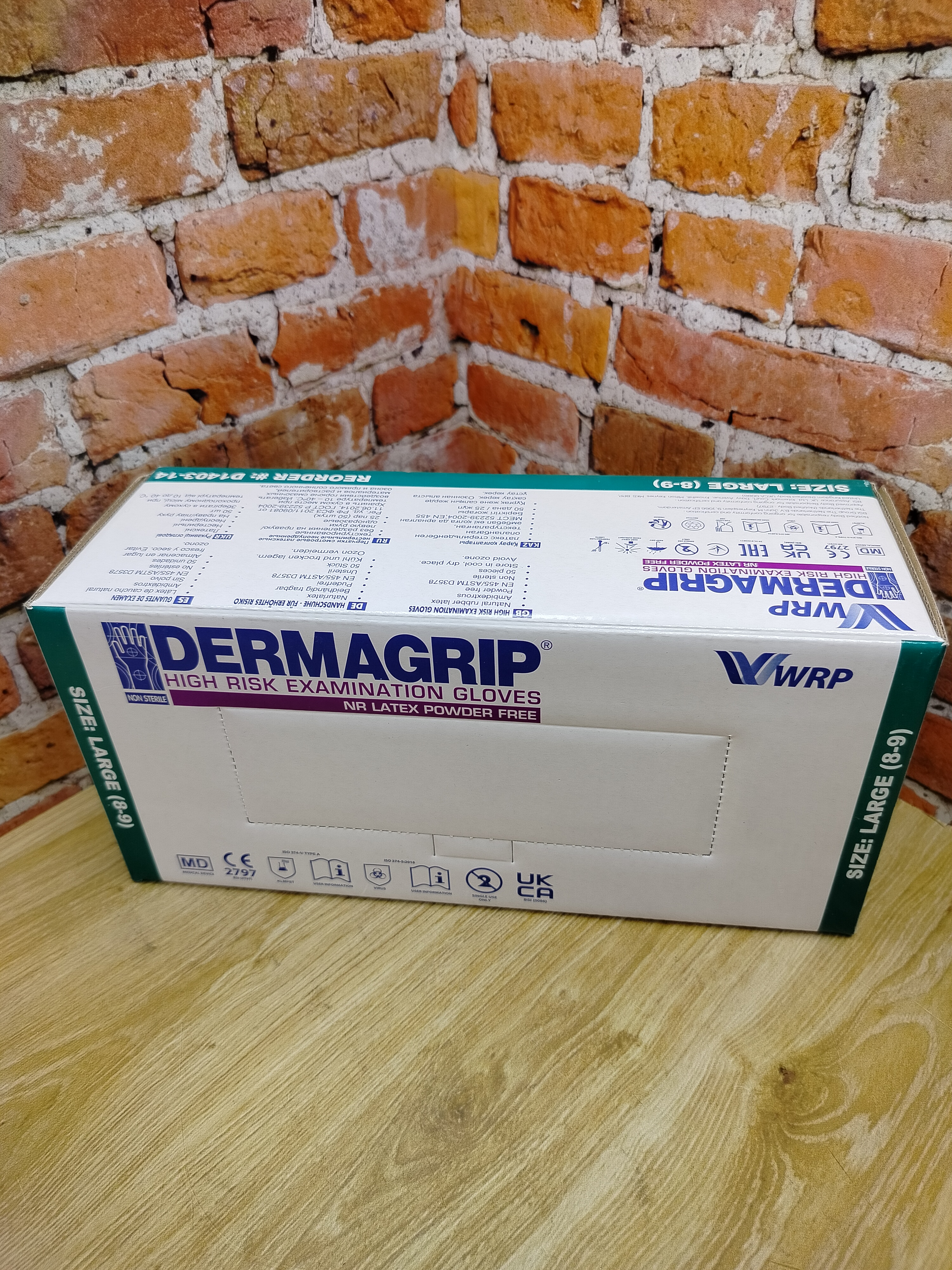 Dermagrip Перчатки смотровые латексные неопудренные нестерильные 25 пар Размер L (8-9)