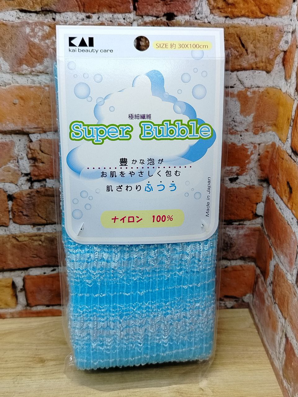 Kai Super Bubble мочалка для тела массажная средней жесткости голубая